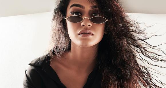 Priya Prakash Varrier shares a steamy photo as she stuns in an edgy look in simple black kurta & ripped denim